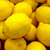A four- with yellow lemons in the top-left and pixelated yellow text on white backgrounds in other