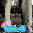A person in gray pants and pink shoes stands on a dark surface with a blue 'love <3' text overlay.