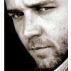 A black-and-white animated sequence shows a man's face with a nose piercing, transitioning from a small star to a large star overlay, then revealing text inside the star.