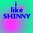 Blue text 'i like SHINNY' on a green-to-pink gradient background with shifting light effects.