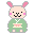Pixel art contact sheet showing two frames of a bunny mascot animation with pink ears, green robe, and cake-like object.