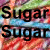 A split-screen image with colorful candy background on top and a honey jar below, displaying text overlays.
