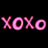 Pixelated pink text 'XOXO' on a black background, rendered in a low-resolution, blocky style with no visible animation.