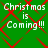 Green background with red diamond lattice pattern and repeated white text "Christmas is Coming!!!" in pixelated font.