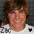 Pixelated static icon featuring a cartoon-style character with brown hair and pinkish skin, set against a dark background with colorful pixel dots, with text "ZAC" at bottom left and black heart symbol on right.