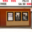 A pixelated image of a theater facade with three framed windows displaying indistinct movie posters, set within a brown wooden frame against a light brown wall.