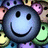 A pixelated smiley face icon with a blue-gray gradient, surrounded by smaller colorful icons on a red background with text.