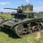 A pixelated military tank in camouflage green and brown on a grassy field under blue sky with white clouds.