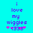 Pixelated text on cyan background with purple and pink elements, showing 'i love my wiggles' followed by star symbols.