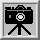 Pixelated camera on tripod with bright flash effect in second frame, gray background within framed border.
