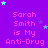 Purple background with repeated text "Sarah Smith is My Anti-Drug" in pink pixelated font, scattered light blue and purple stars.