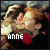A pixelated image of two people embracing, with text and a heart symbol changing across frames.