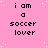 Pink background with white speckles and repeated black text "i am a soccer lover" in pixelated font across four