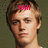Two side-by-side pixelated images of a person with light brown hair against a dark green background, one displaying pink text above the head and another below.
