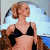 A split-frame contact sheet showing a woman in a black bikini top on the left and green text reading "Original Icons .com" on the right, with visible pixelation and dithering effects.