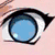 Anime-style character face with blue eyes, a small nose, and a straight mouth; four colored circles with text below.