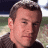 A contact sheet of two animated frames showing a pixelated human face on the left and green text logo on the right against dark background.
