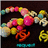 Pixelated image of a colorful, abstract arrangement with pink, yellow, orange, and teal shapes against dark background.