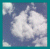 Static pixelated image of a white cloud against a blue sky background with teal border.