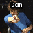A person in a blue shirt holds a small object with both hands, with text overlays changing across frames.