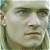 Static 50x50 pixel icon showing a close-up of a human face with neutral expression, rendered in low-resolution grayscale tones on a transparent background.