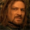 A four- shows a character with long brown hair and a beard, with text changing in the bottom-right