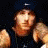 Animated contact sheet of a 48x48 pixel buddy icon showing Eminem with repeated text "chillen with my homies" in red and yellow, arranged in a 5x4 grid on gray background.
