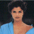 A 50x50 pixel animated buddy icon featuring a woman in a blue top on the left and green text reading "Original Icons .com" on the right, displayed as a contact sheet with two frames.