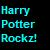 Static pixelated image with cyan text reading 'Harry Potter Rocks!' on a dark background with scattered colored pixels.