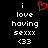 A black background displays white pixelated text reading 'i love having sexxx <33' with a red heart symbol above the word 'love'.