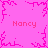 Pixelated pink background with four 'Nancy' text labels and branching line patterns at corners.
