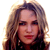 Static pixelated image of a person with long wavy hair and dark clothing against a white background.