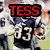 A football player in a dark blue jersey with white number 33, helmet, and shoulder pads, with red text "TESS" above the head.