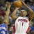 Pixelated image of a basketball player in white jersey with red text and number 1, holding a ball, next to an animated 'DIS' logo with teal, orange, black, and white colors.