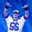 Pixelated figure in white jersey with blue number 55, arms raised against solid blue background.