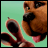 Brown dog with black nose and pink tongue, holding a dark brown object against light green background.