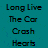 Pixelated text on a teal background with blue speckles, displaying 'Long Live The Car Crash Heart Thriller' in a glitchy font.