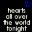 Blue pixelated heart symbol above white text reading 'hearts all over the world tonight' on black background.