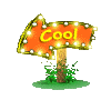 Animated orange sign with 'Cool' text, glowing lights around border, mounted on wooden post with green grass base.