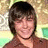 A pixelated image shows a person with brown hair and a brown top on the left, next to blue background text reading "My hottie a.k.a. Miss Efron".