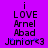 Purple background with black text reading 'i LOVE Arnel Abad Junior<3' in pixelated font, blue star-like accents on the word 'Junior'.