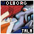 Pixelated image of a character with red hair and blue eyes, wearing a blue outfit, with text 'WOLBORG' above and 'TALA' below.