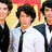 six pixelated images showing a person with dark curly hair in various poses and settings, including group shots, close-ups, and heart symbols