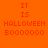 Orange background with red pixelated text reading "IT IS HALLOWEEN BOOOOOO" in two identical horizontal sections.