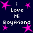 Dark blue background with pink star shapes and white text reading "i Love Mi Boyfriend" arranged in a pattern