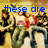 A pixelated image with blue text reading "these are MY home boys" over a group of people in casual clothing, some holding objects.