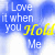 Blue background with white text reading "I Love it when you Hold Me" where the word "Hold" alternates between yellow and pink in an animation.