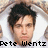Pixelated image of a person with dark hair lying on a white pillow, with text reading "Pete Wentz Is Uber Sexy" in black block letters.
