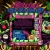 Pixelated static image of a colorful, abstract structure resembling a small house or shrine with a dark central opening, surrounded by green and brown elements.