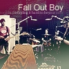 Pixelated image of a band performing on stage with 'Fall Out Boy' text at top, featuring a guitarist, drummer, and bassist in a dark venue with stage lighting.
